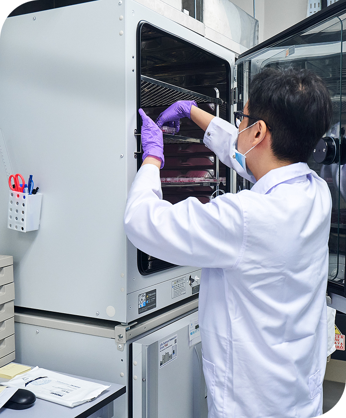 Scientist working with lab equipment